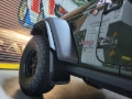 Picture of Rally Armor 19-25 Jeep JT Gladiator (Mojave/Rubicon) Black Mud Flap w/Metallic Black Logo