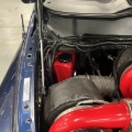 Picture of Wehrli 04.5-07 Cummins 5.9L Coolant Tank (OEM Placement) - Candy Red