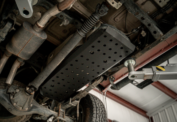 Picture of Cali Raised 05-23 Dcsb / Ac Toyota Tacoma Fuel Tank Skid Plate - Steel / Powder Coat