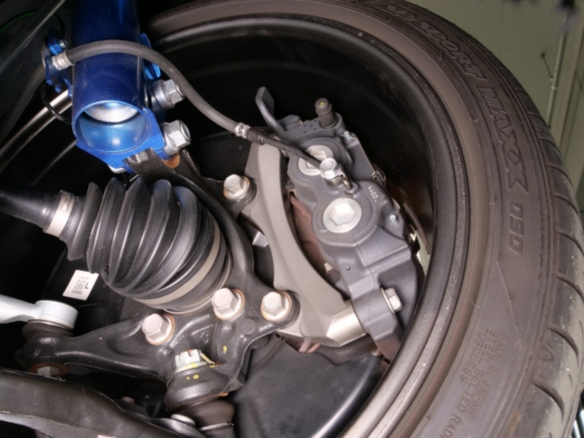 Picture of Cusco 23-25 Toyota GR Corolla Light Weight Front Brake Caliper Bracket - Billet Aluminum