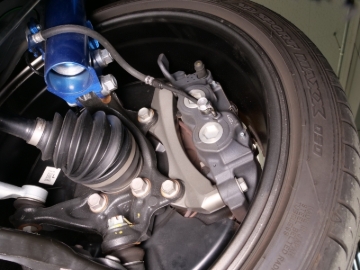 Picture of Cusco 23-25 Toyota GR Corolla Light Weight Front Brake Caliper Bracket - Billet Aluminum
