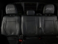 Picture of PRP 12-14 Ford Raptor  Rear Bench Seat Covers- Black with Silver Stitch