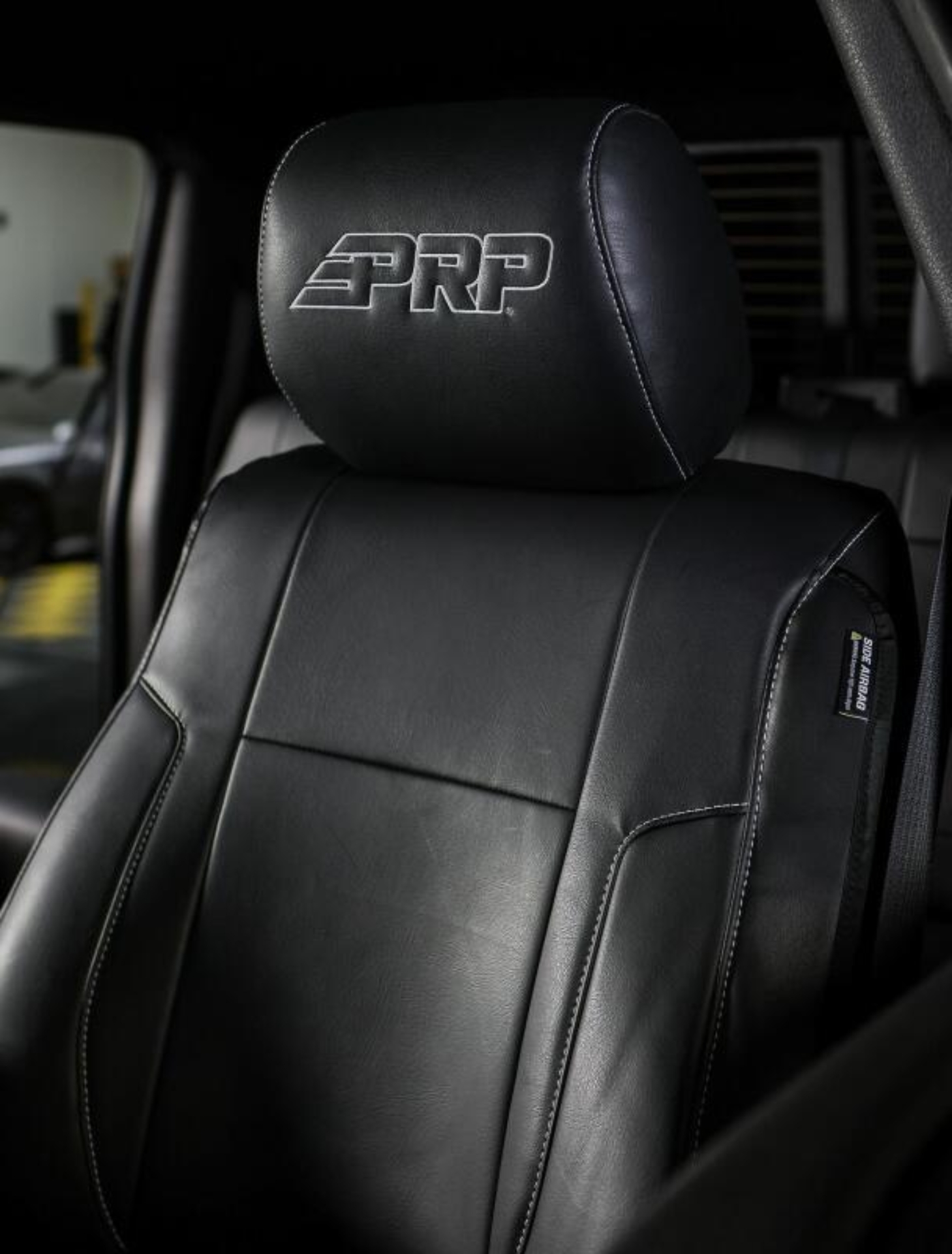 Picture of PRP 12-14 Ford Raptor Front Seat Covers (Pair) - Black w Silver Stitch
