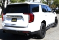 Picture of Gibson 21-23 GMC Yukon XL Denali/Chevrolet Suburban 6.2L 2/4wd Black Elite Cat-Back Exhaust